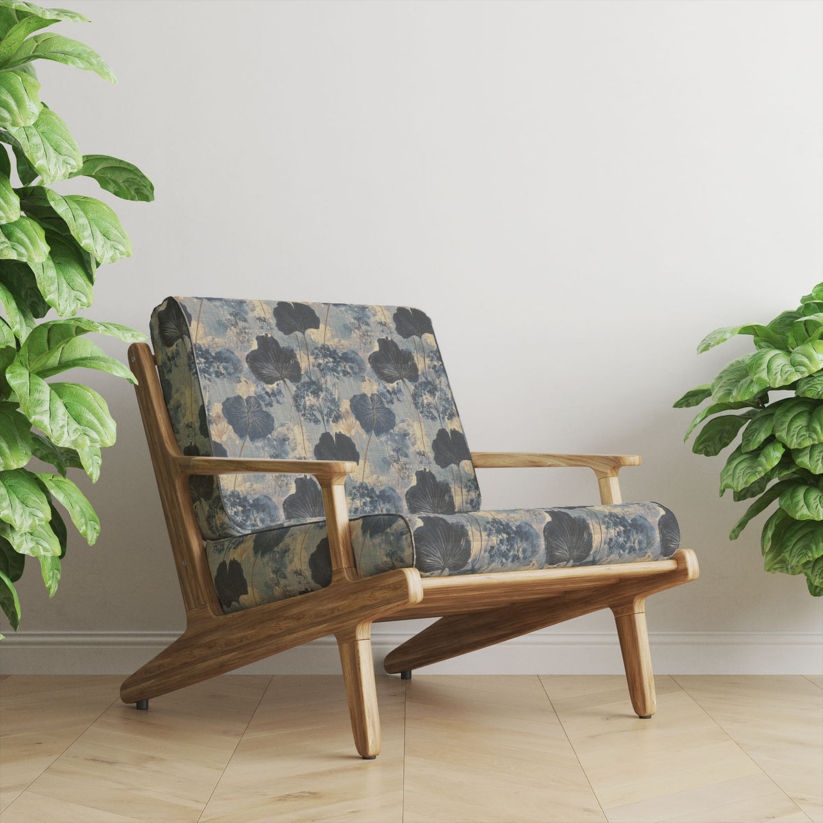 Foliage Leaf No.5 navy botanical upholstery fabric styled on an elegant accent chair