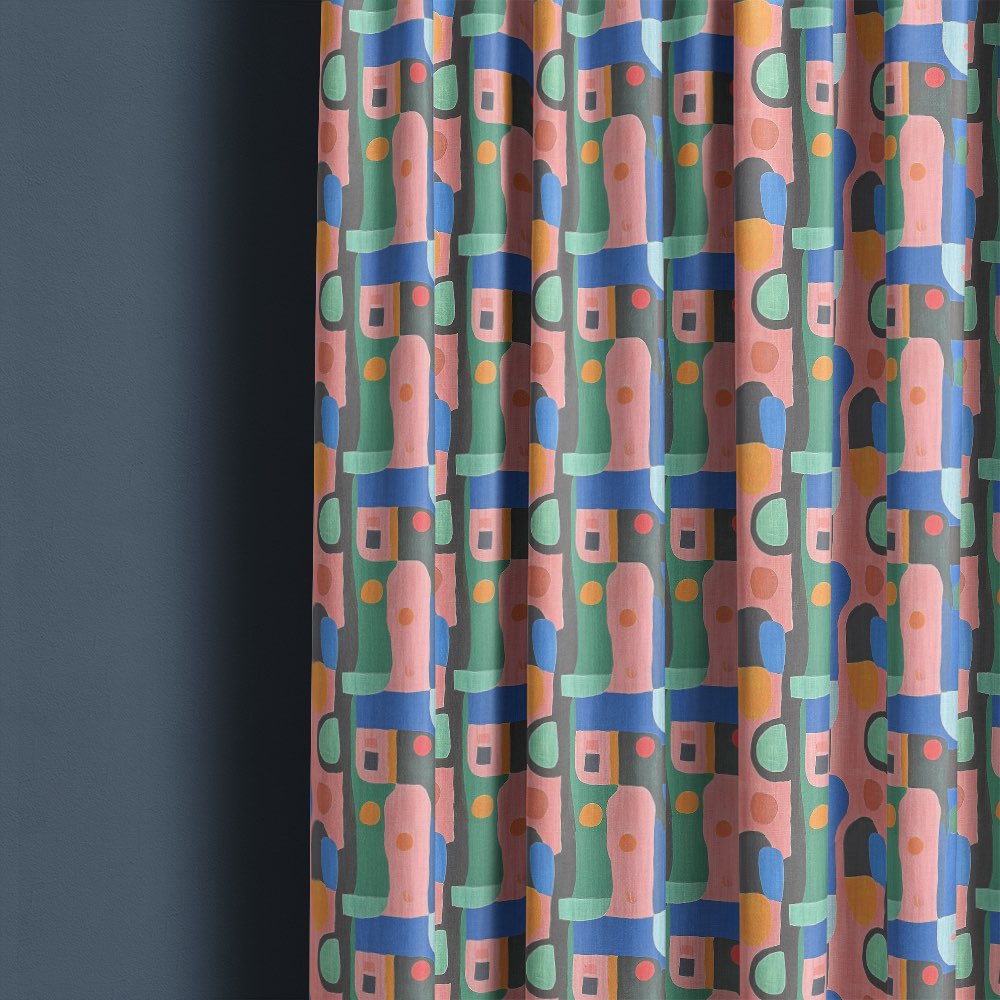 Fresco No.16 curtain fabric showing abstract pastel geometric pattern styled as full length curtains