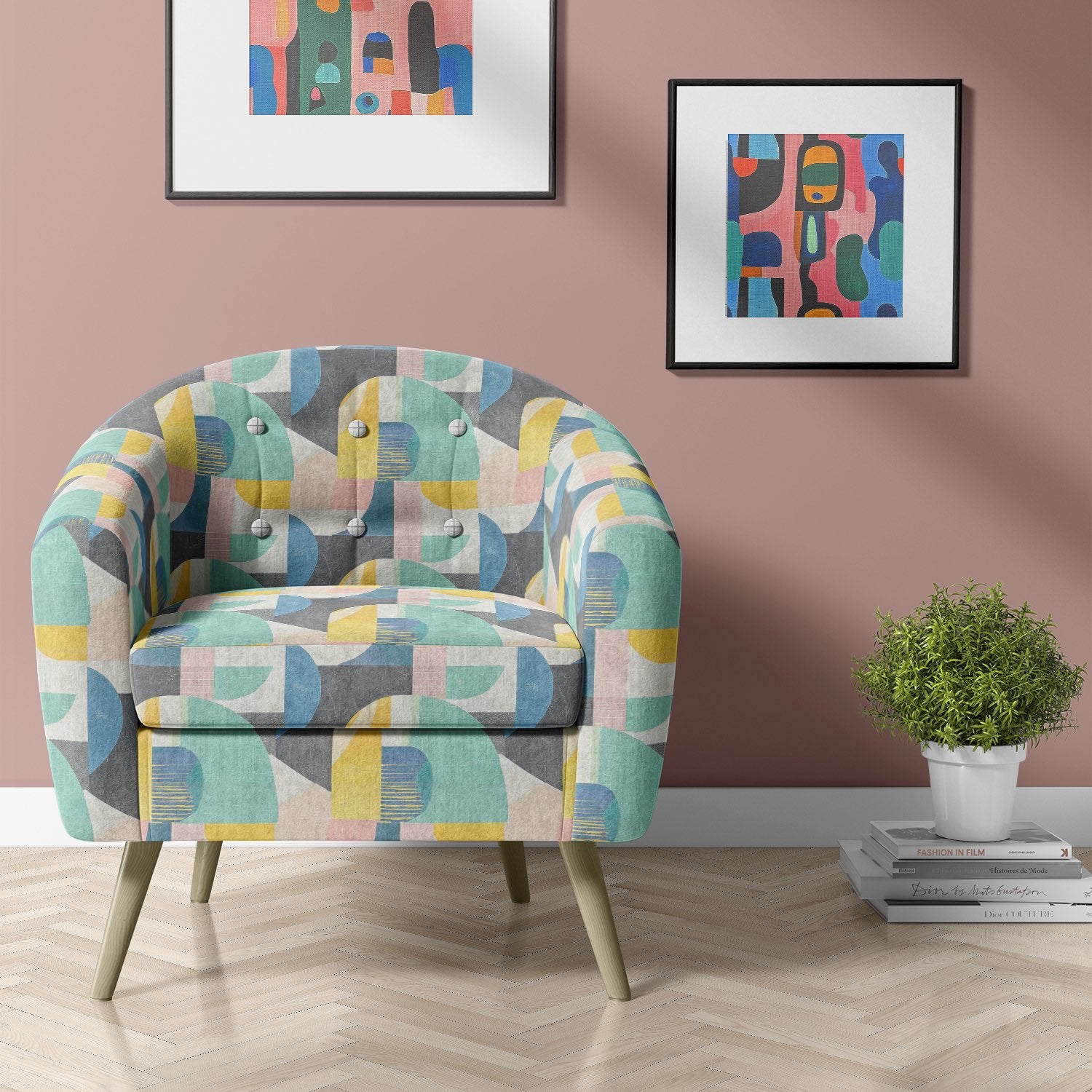 Upholstered armchair in Fresco No.1 upholstery fabric with mid-century framed artwork