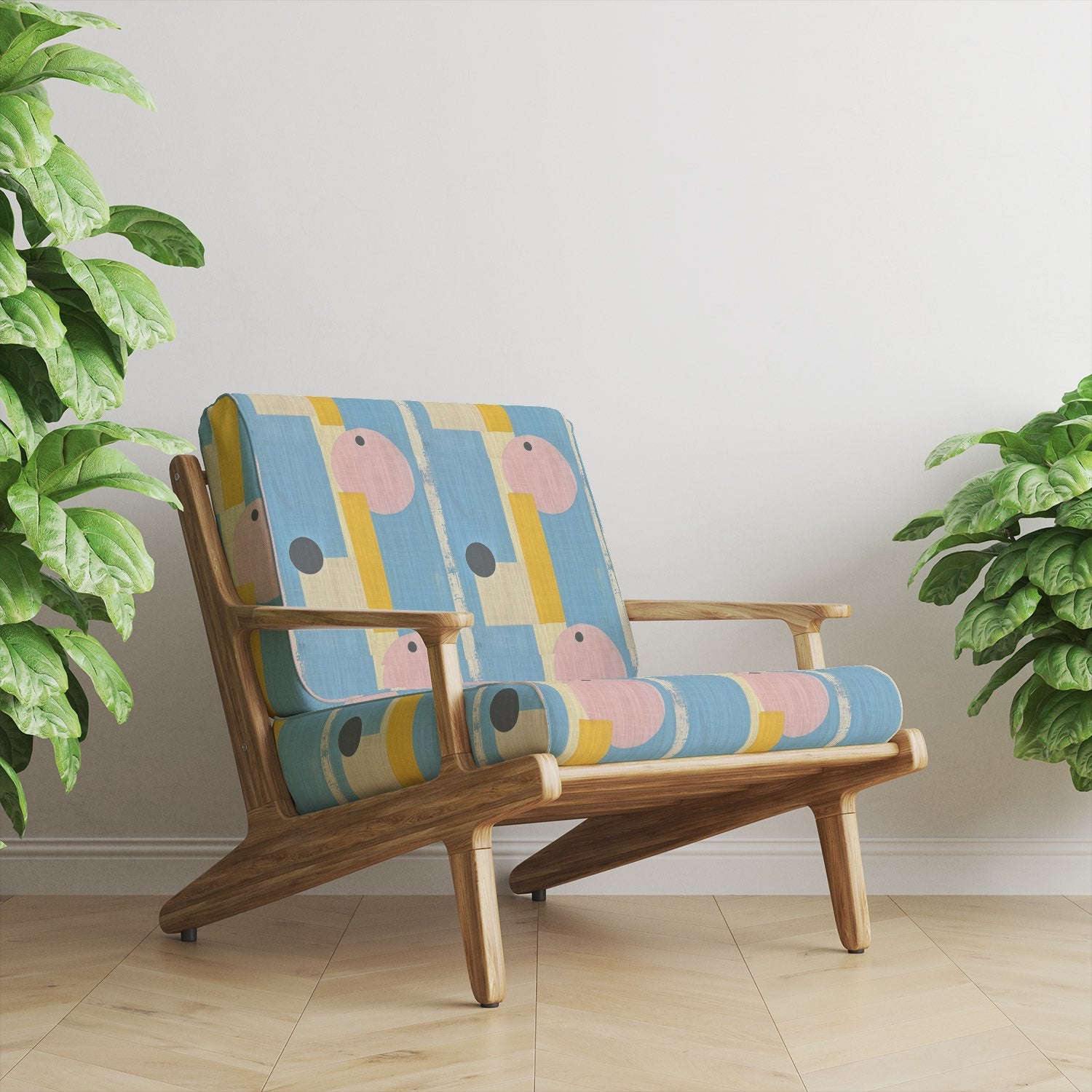Fresco No.3 blue, yellow and pink modernist abstract upholstery fabric on a retro chair – ideal for bold interiors.