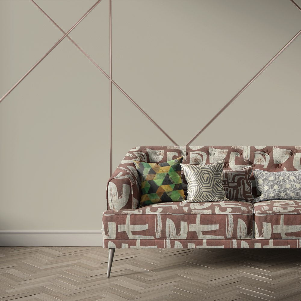 Geometric upholstery fabric on modern sofa with terracotta and neutral abstract geometric pattern – Geometry No.2 upholstery fabric