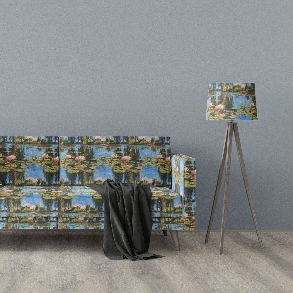 Giverny No.7 impressionist style upholstery fabric displayed on sofa and lampshade with water lily pond scene in blue, green and pink tones