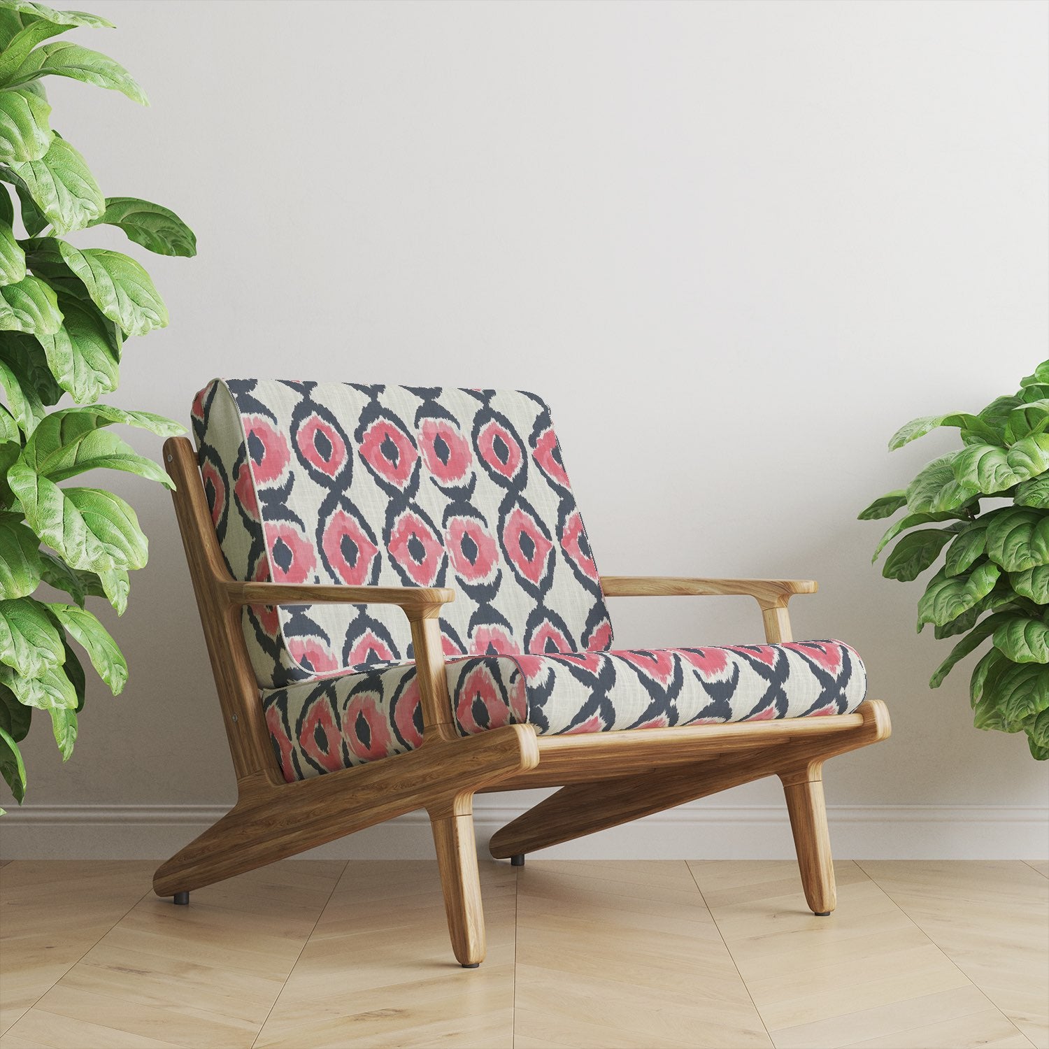  Mid-century style armchair upholstered in Kilim No.25 upholstery fabric with pink and charcoal ikat design