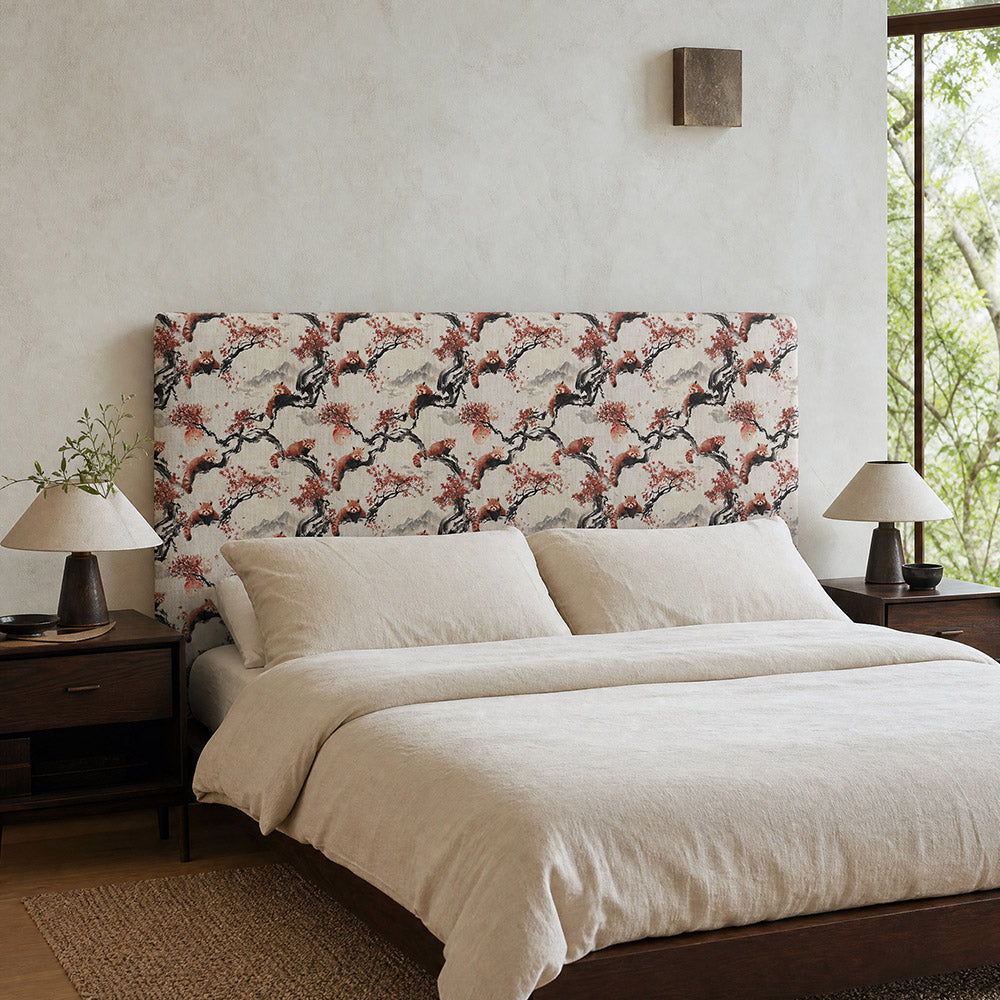 Kintsu No.12 red panda Japanese upholstery fabric styled on a statement headboard in cream and terracotta