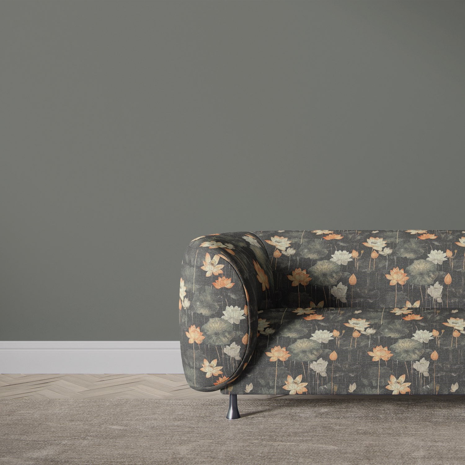 Upholstered sofa in Lotus No.7 floral upholstery fabric in a room with grey walls and wood flooring