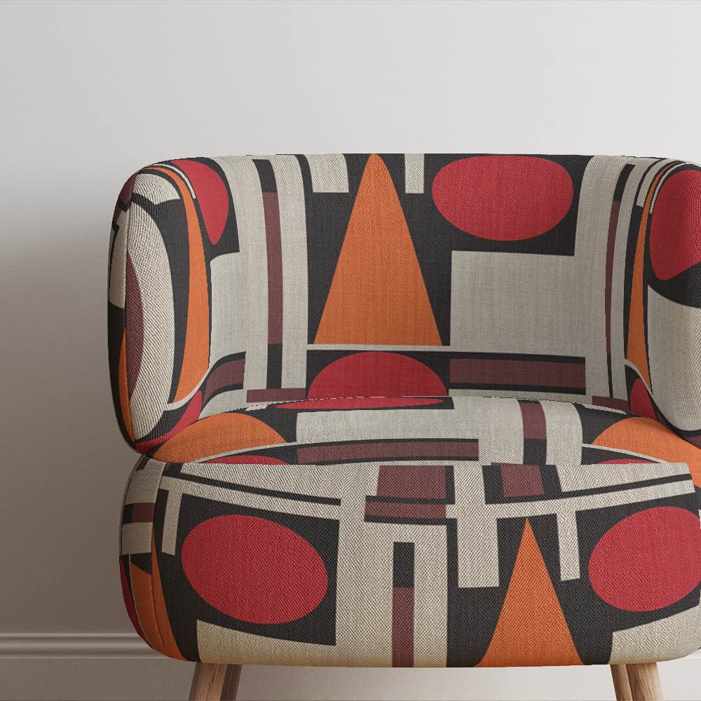 Malaga No.12 upholstery fabric on modern chair with structured geometric print
