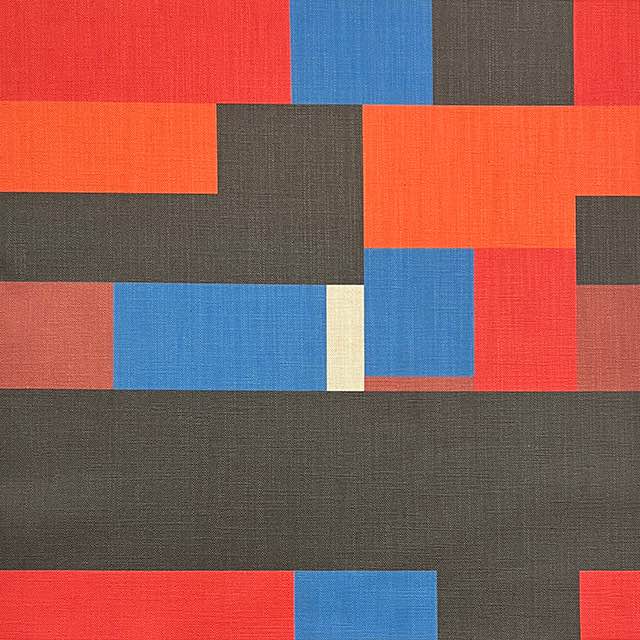 Blue Bauhaus-inspired upholstery fabric with coral and charcoal blocks – Malaga No.15 flat lay
