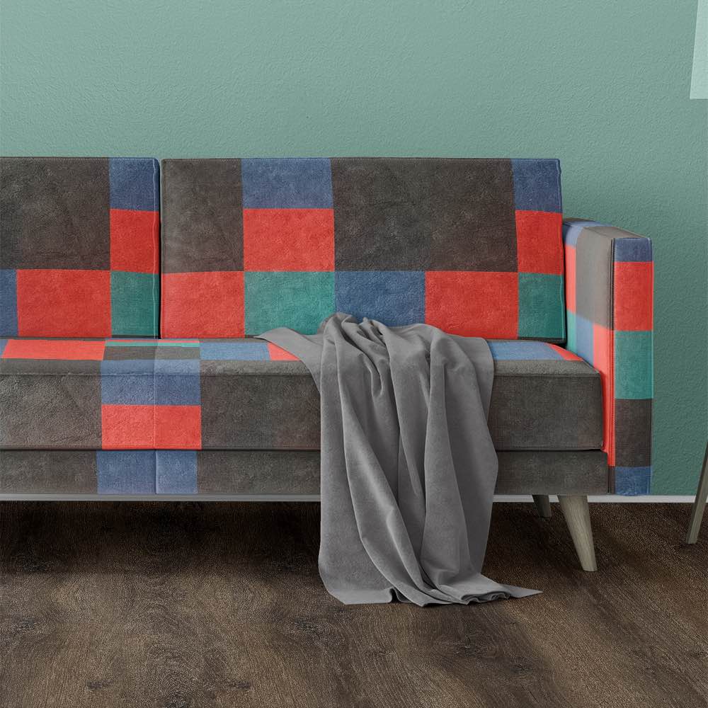 Malaga No.2 bold geometric upholstery fabric styled on a modern sofa