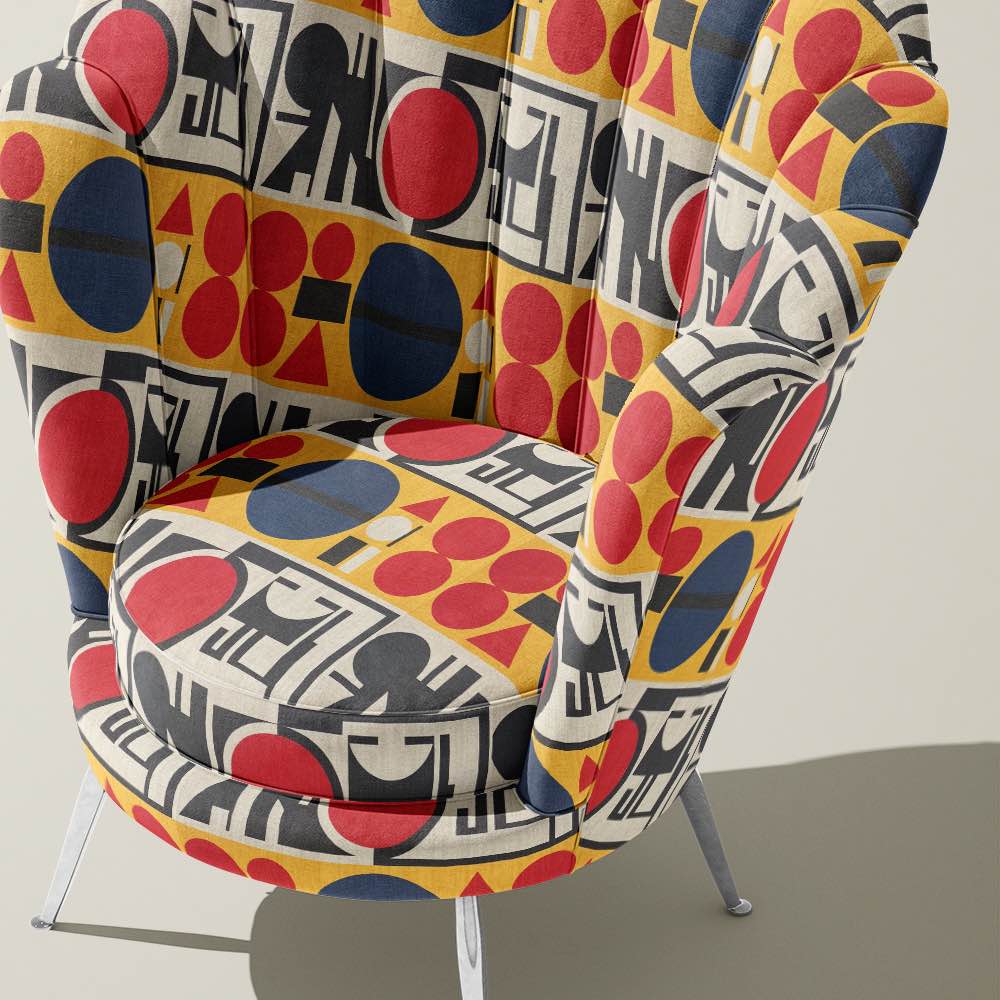 Malaga No.9 multicoloured upholstery fabric styled on statement accent chair
