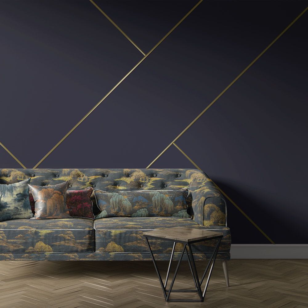 Navy and gold Japanese upholstery fabric sofa with elegant landscape pattern in a modern interior setting
