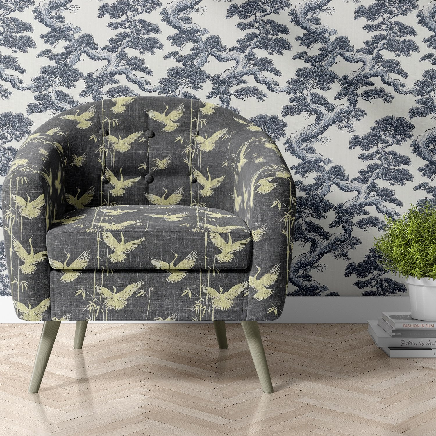 Upholstered armchair in Mori No.3 crane print upholstery fabric with grey background