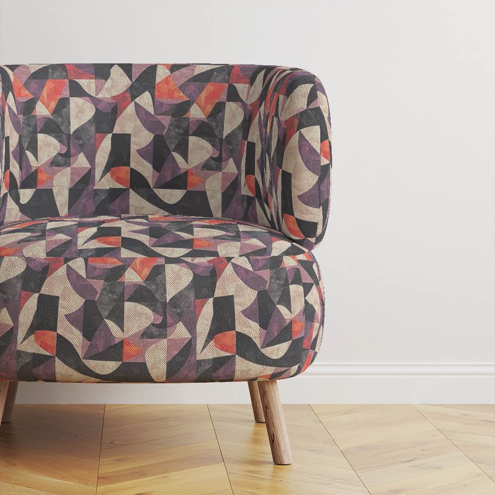 Movements No.1 fabric on chair – bold purple, orange, and charcoal upholstery design