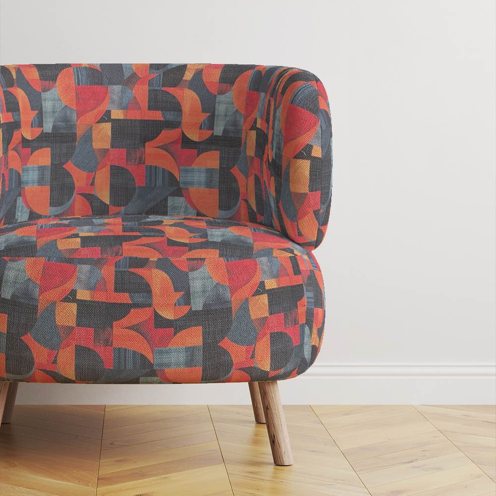 Movements No.4 styled on sofa – bold blue and burnt orange upholstery fabric design