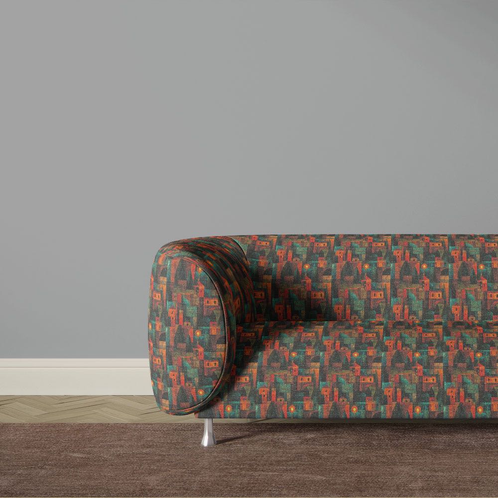 Dark abstract upholstery fabric sofa with geometric architectural design in teal green and burnt orange inspired by modernist art