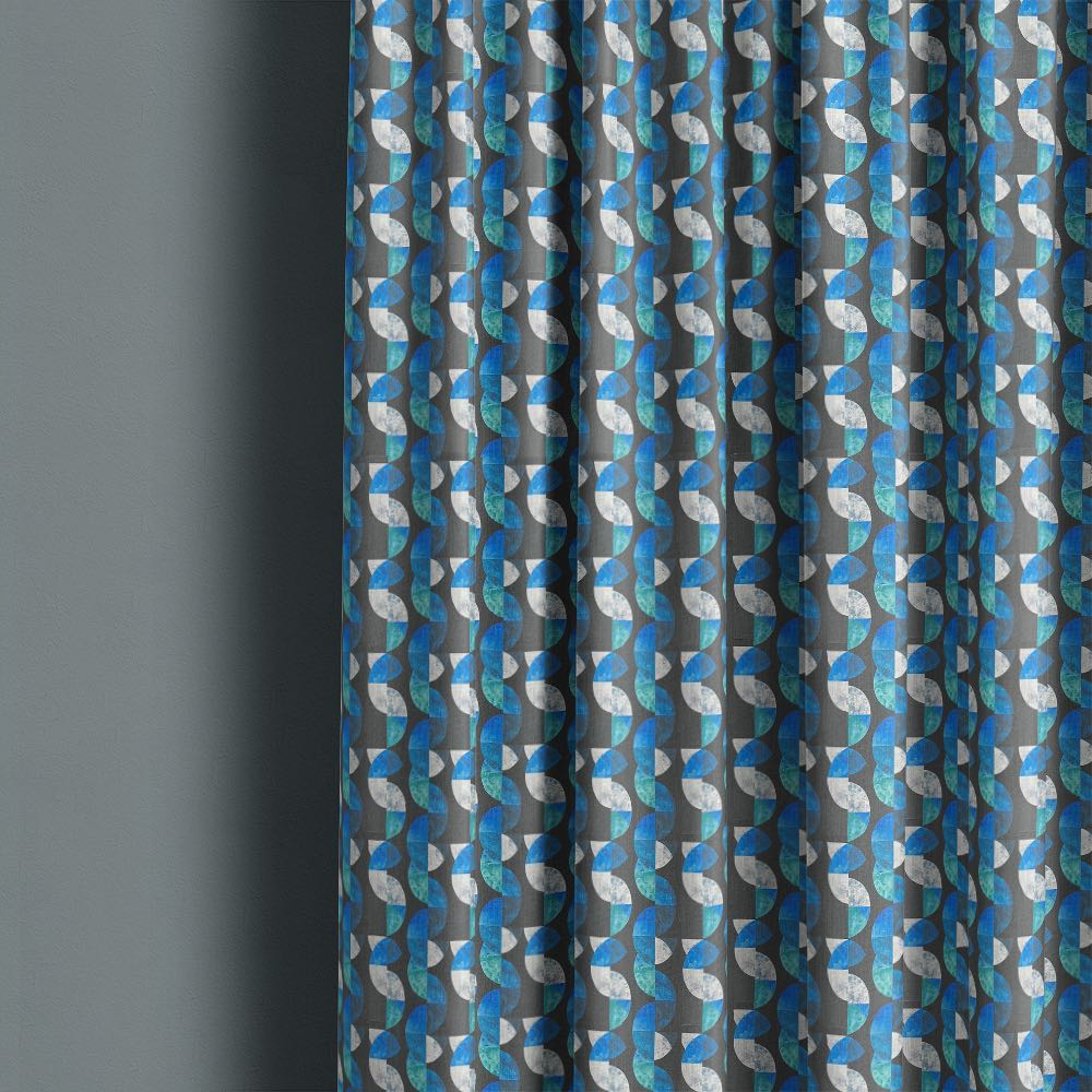 Palette No.5 linen curtain fabric made into full length geometric curtains in blue and charcoal tones