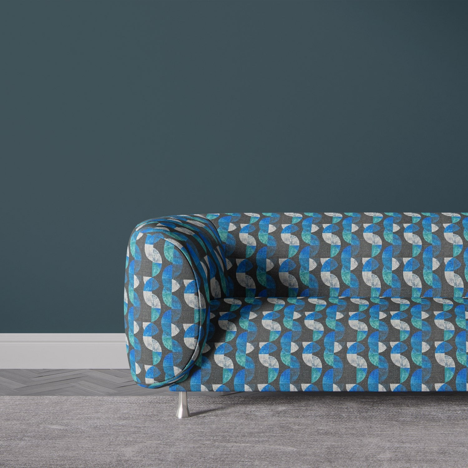 Sofa upholstered in Palette No.5 bold blue abstract geometric upholstery fabric