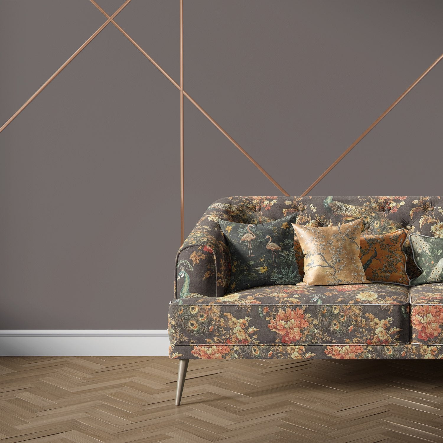 Pavone No.10 bird upholstery fabric on a sofa with ochre and rust floral detailing