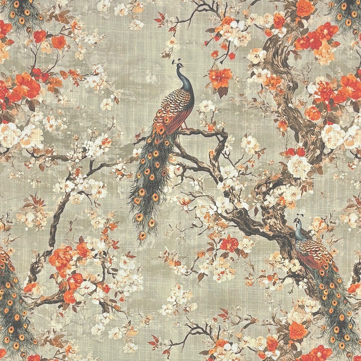 Pavone No.1 bird upholstery fabric featuring peacocks and floral branches in orange and ivory on a sage background