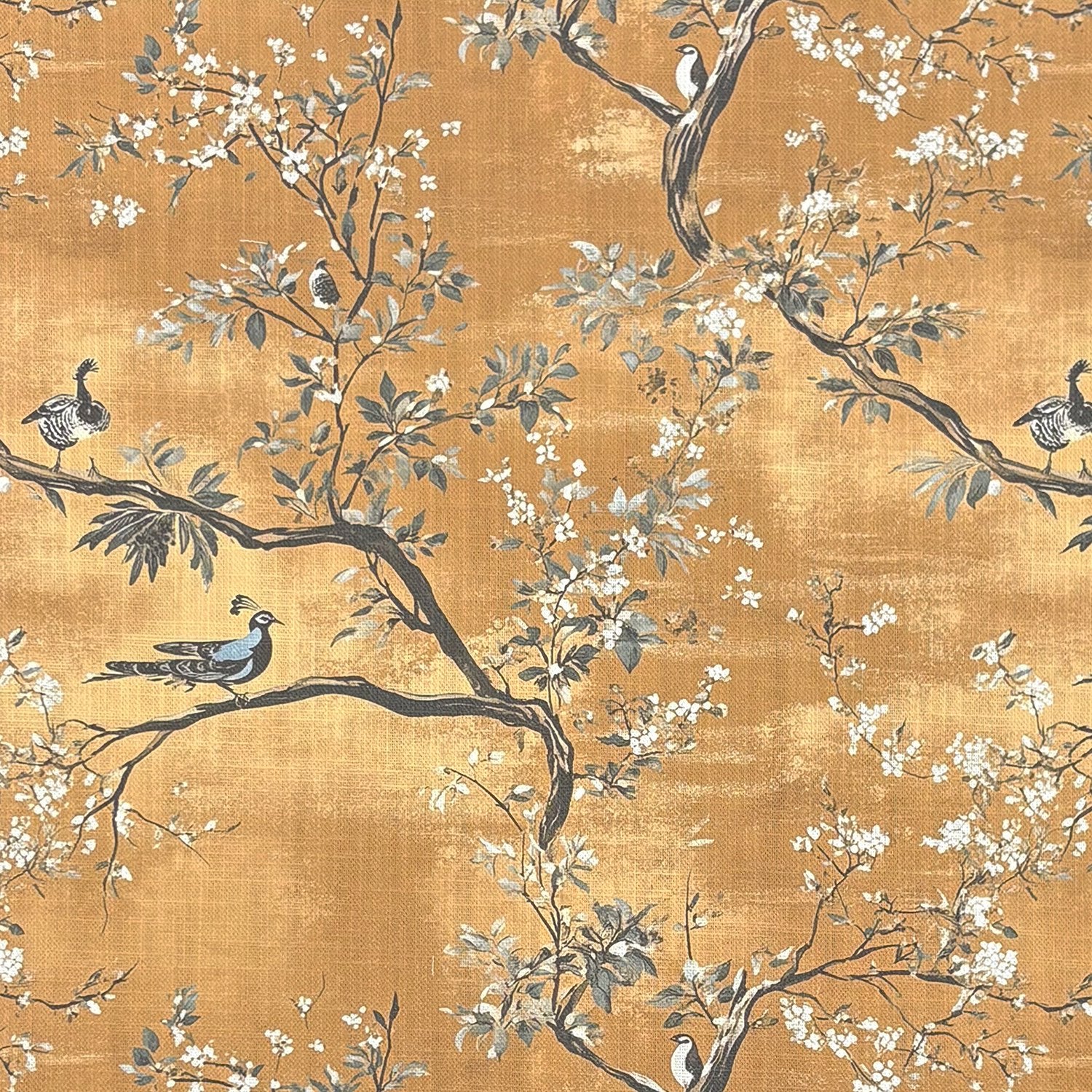 Ochre yellow upholstery fabric with painterly birds and blossom – Pavone No.3 by Saint and Poet