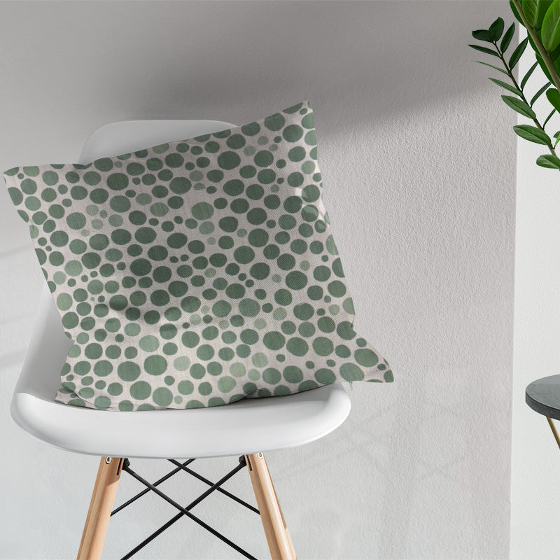 Cushion in Pointillia No.3 sage green polka dot curtain fabric for calm luxury interiors