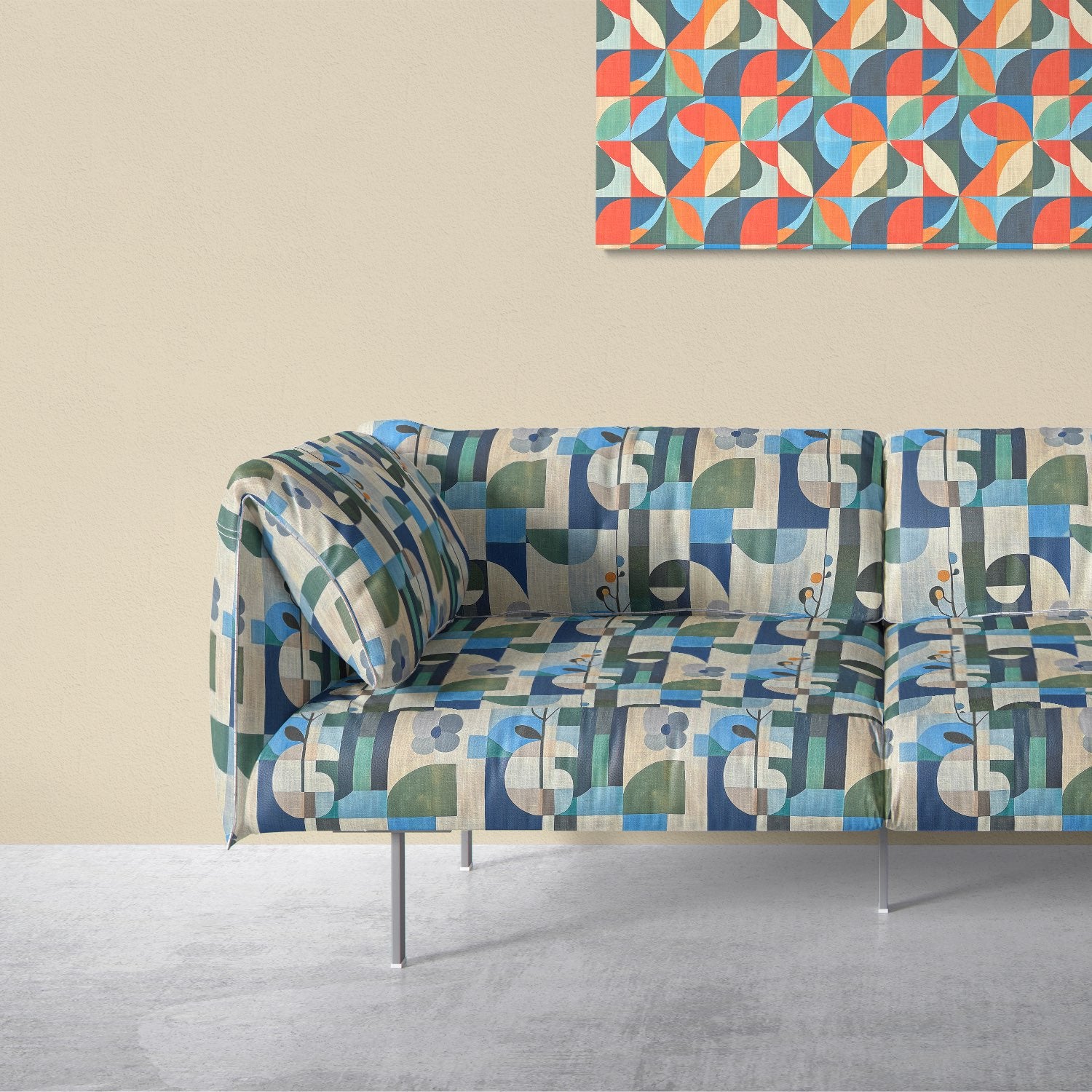 Populist No.15 multicoloured upholstery fabric on modern sofa – abstract green and blue floral pattern