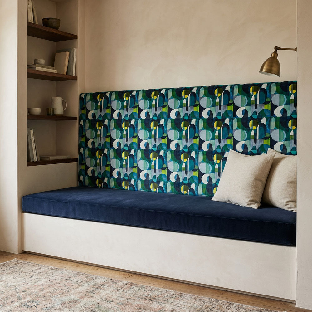 Populist No.12 Crib5 velvet upholstery fabric shown on a cool blue green bench