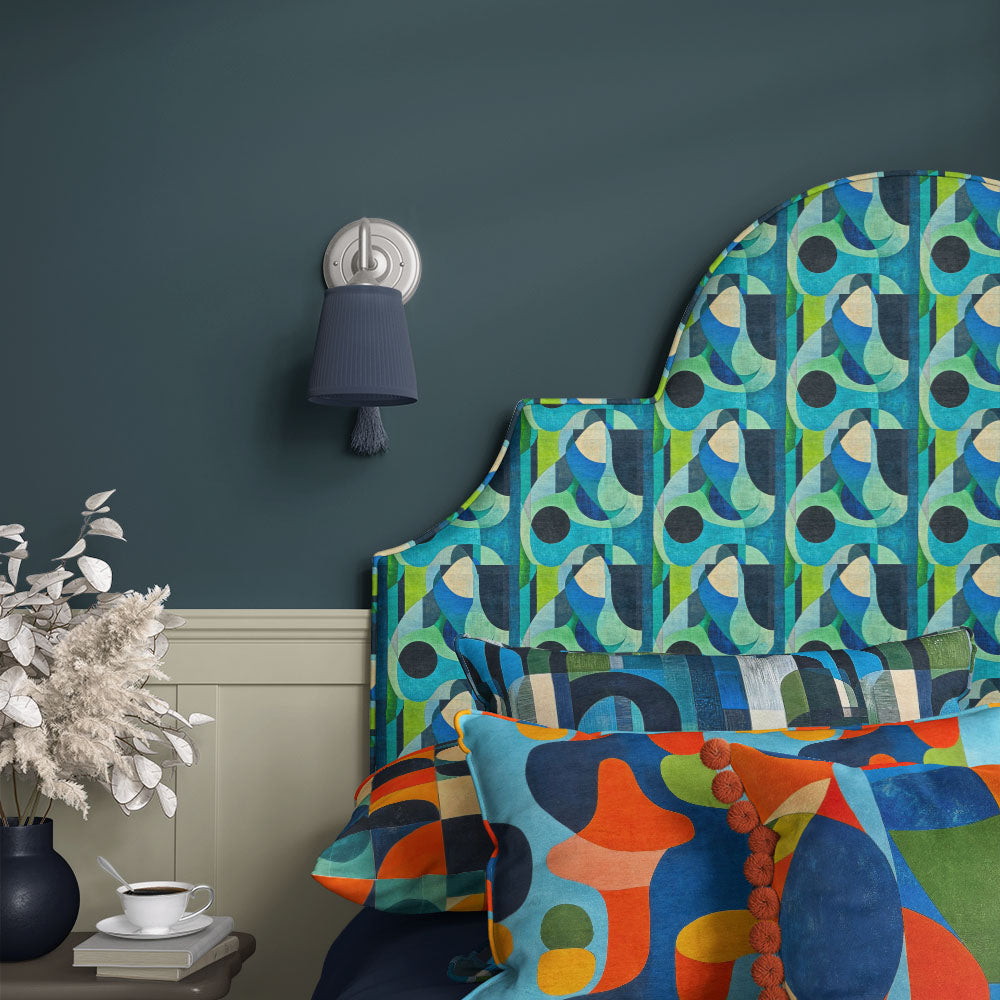 Populist No.16 Crib5 velvet upholstery fabric shown on a headboard for blue green interiors