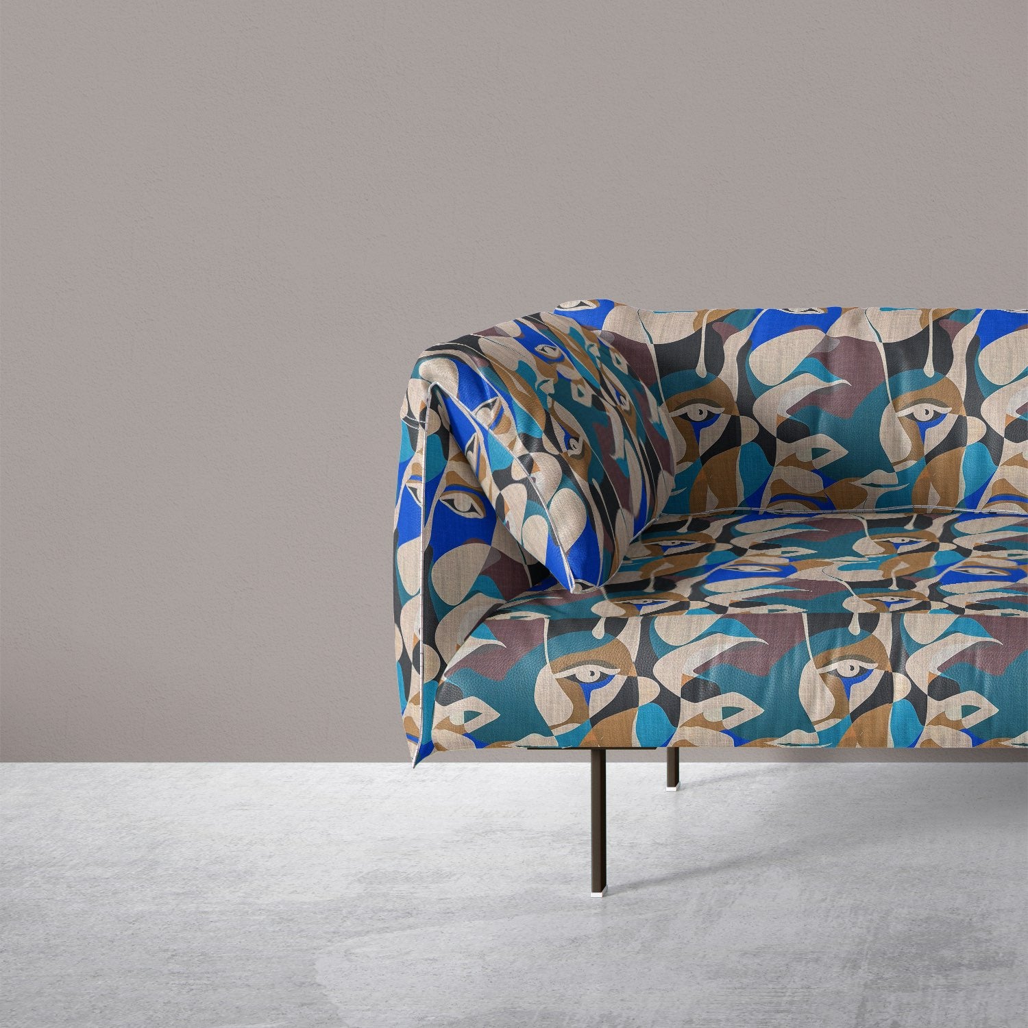 Sofa upholstered in Sculpture No.13 bold abstract cubist-style upholstery fabric
