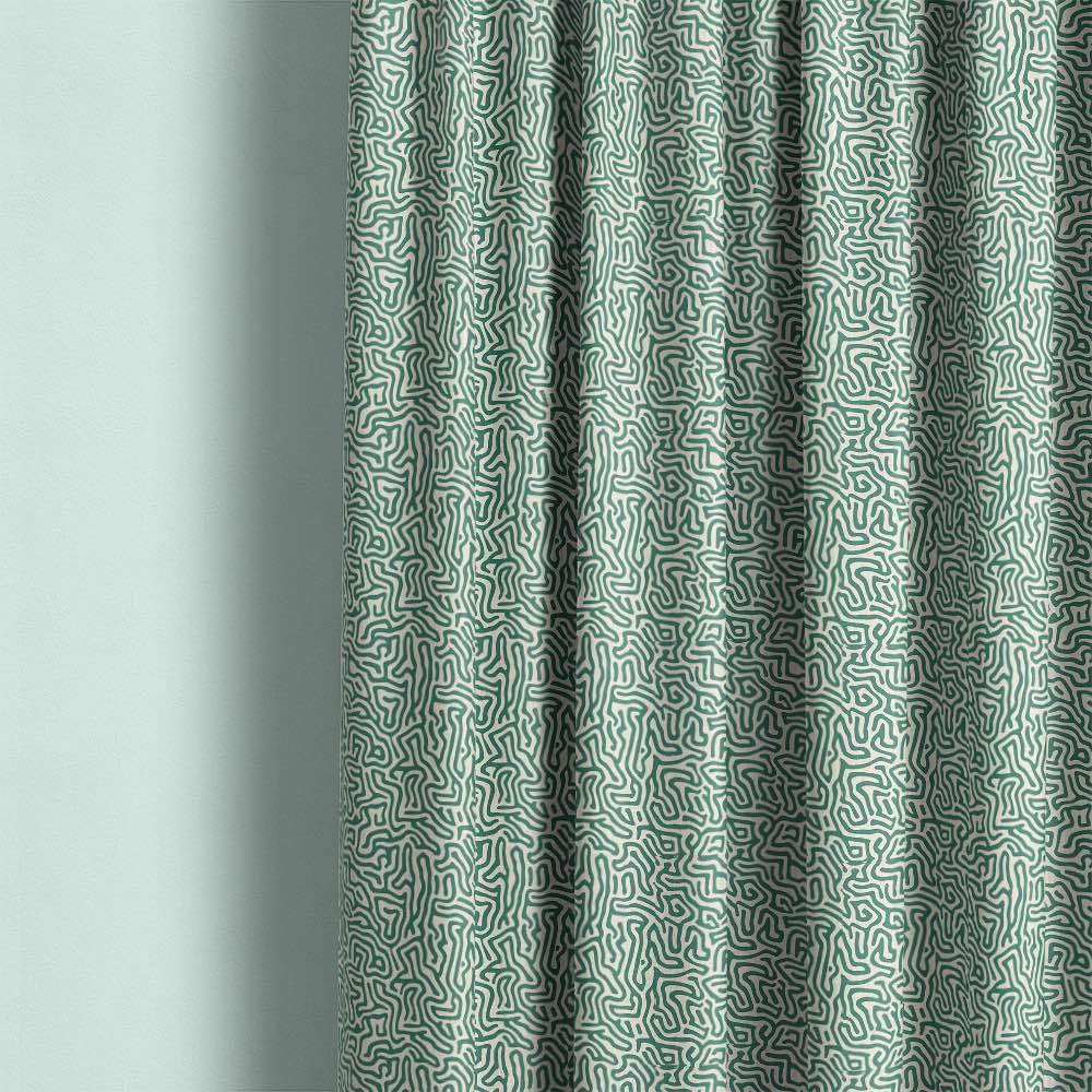 Modern green printed linen curtain fabric with organic abstract linework in soft contemporary interior setting