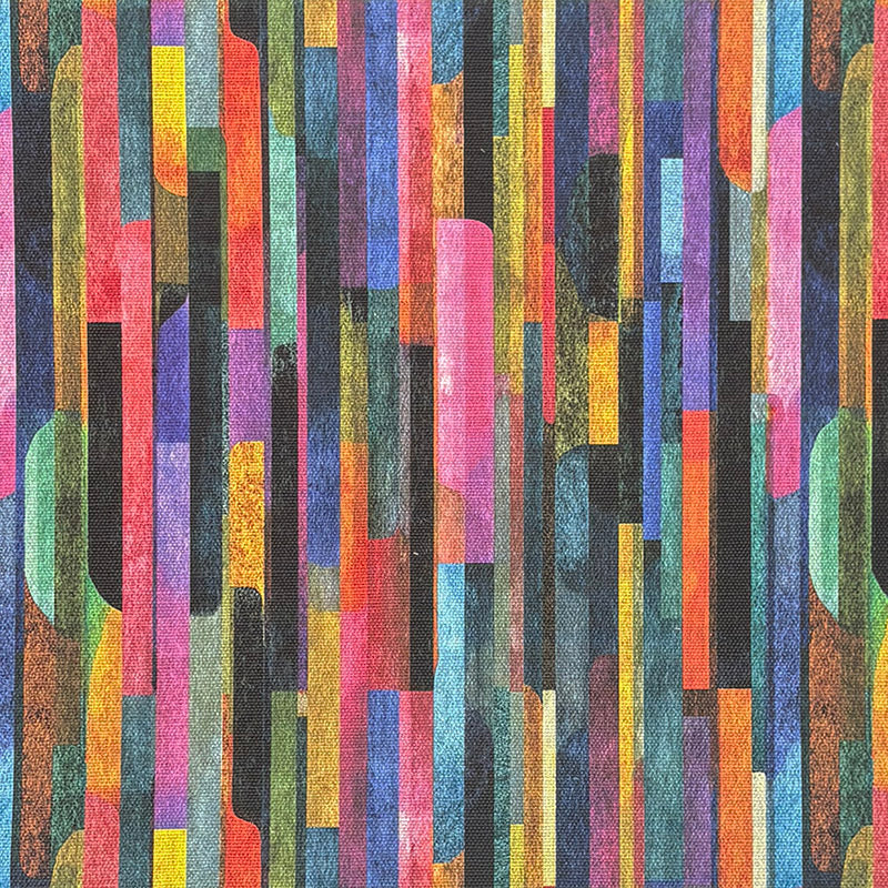 Multicoloured striped upholstery fabric with painterly columns in bold rainbow colours on charcoal background