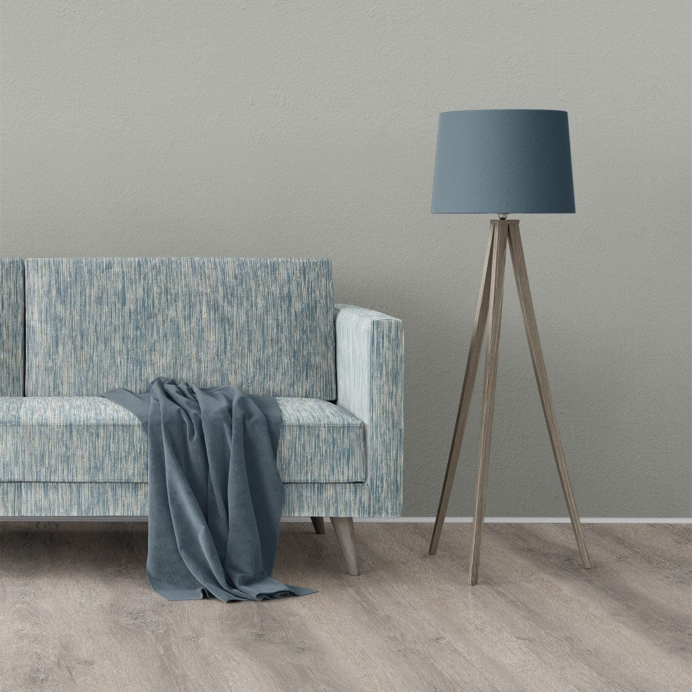 Striped No.24 sofa image – modern sofa upholstered in Striped No.24 blue striped upholstery fabric, styled with a soft grey throw