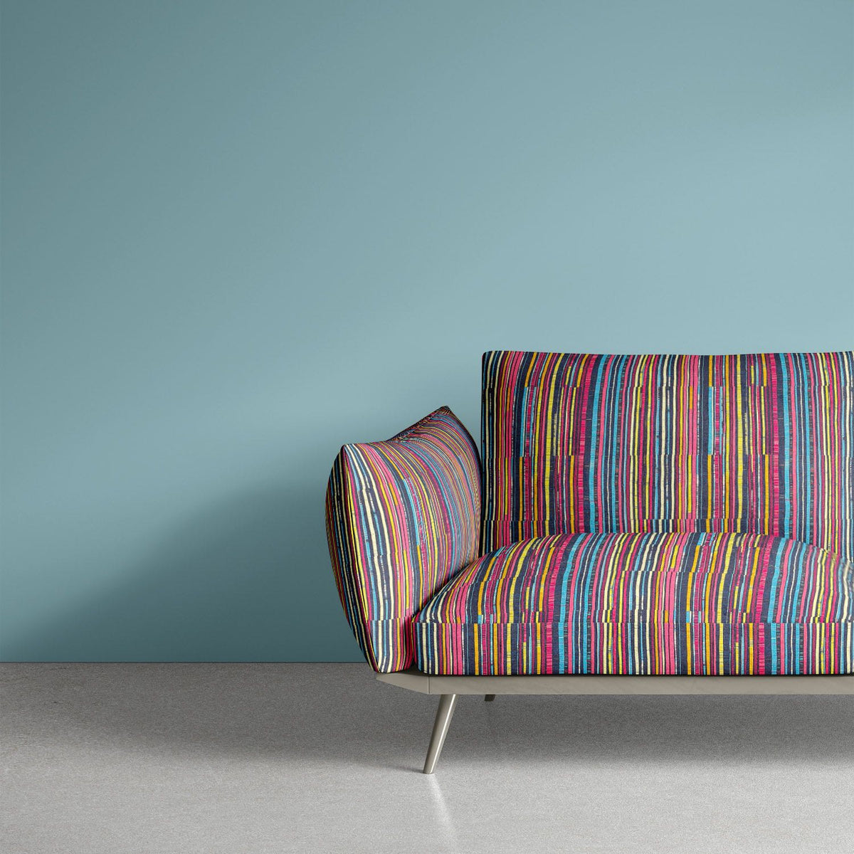 Luxury sofa upholstered in Striped No.11 fuchsia, yellow, cobalt, coral and teal fine stripe Crib5 printed velvet