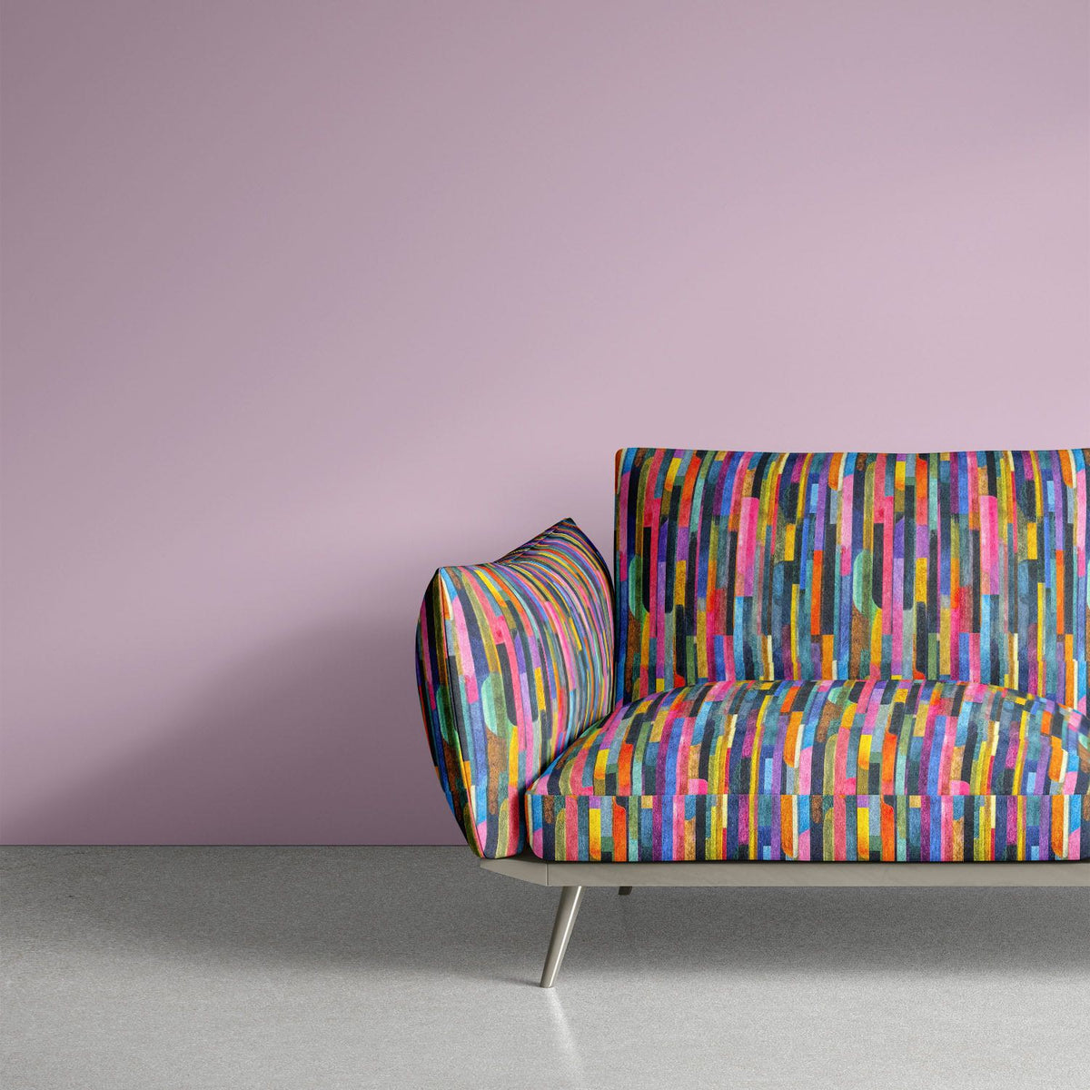 Luxury sofa upholstered in Striped No.18 jewel-toned multicoloured stripe on charcoal Crib5 printed velvet