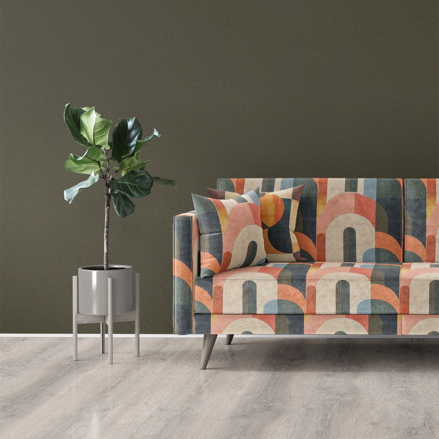 Sofa upholstered in Symbolic No.22 upholstery fabric with abstract arch pattern in warm and cool tones