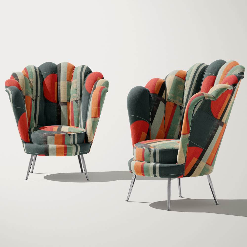 Modern accent chairs upholstered in teal geometric upholstery fabric