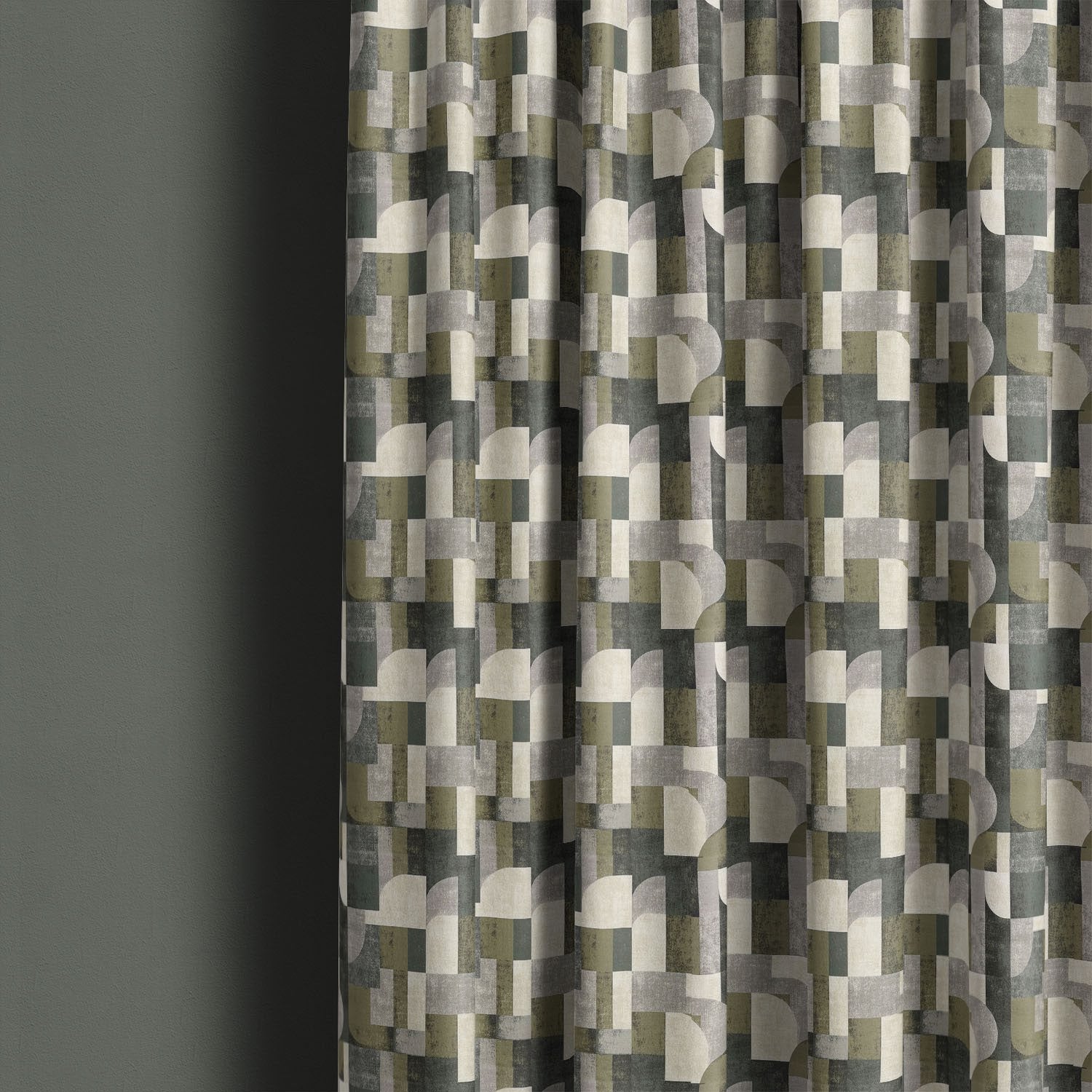 Texture No.12 green linen curtain fabric styled as curtains showing layered curved shapes in moss green and grey tones