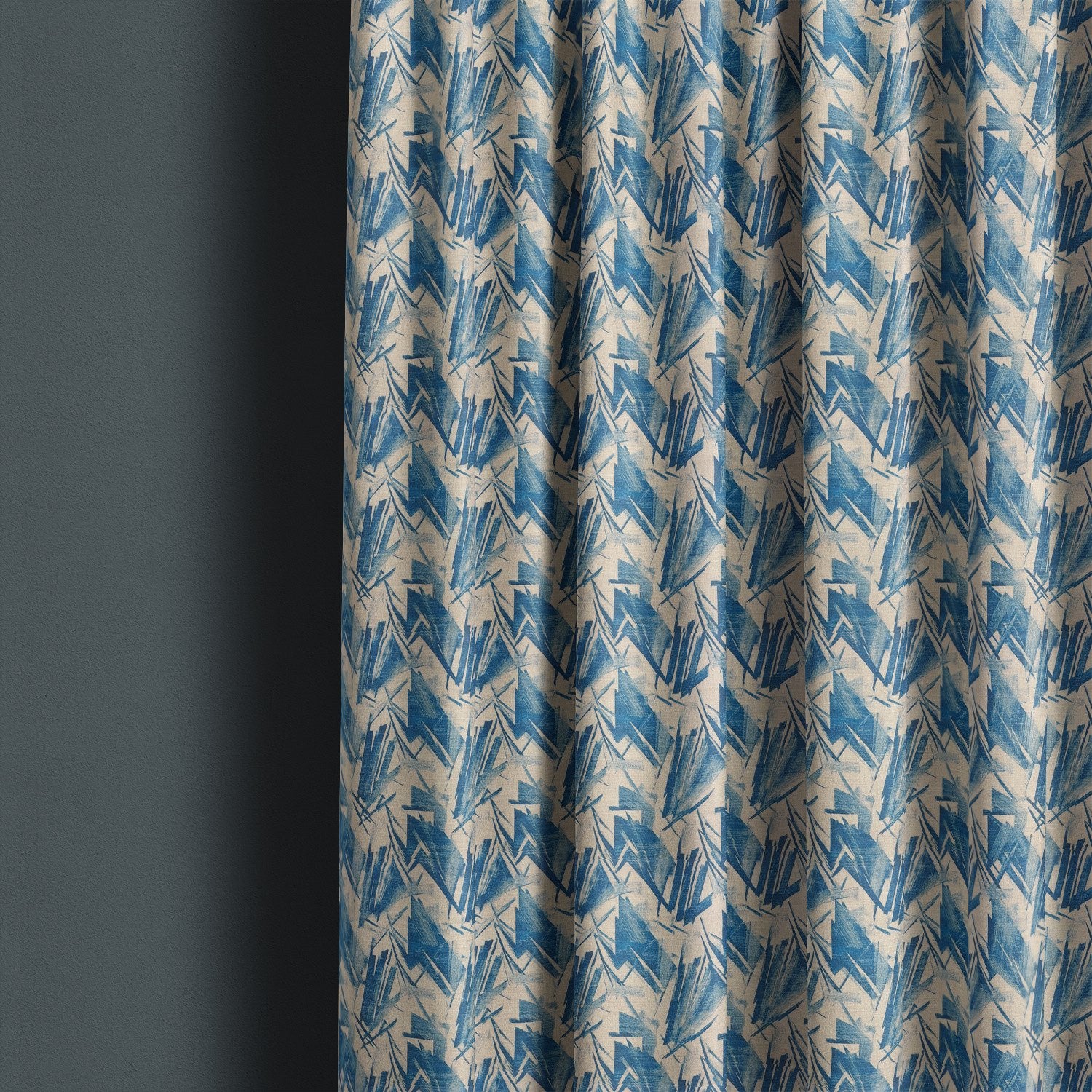 Texture No.7 blue linen curtain fabric hanging in folds showing bold geometric brushstroke design in vibrant and denim blue shades