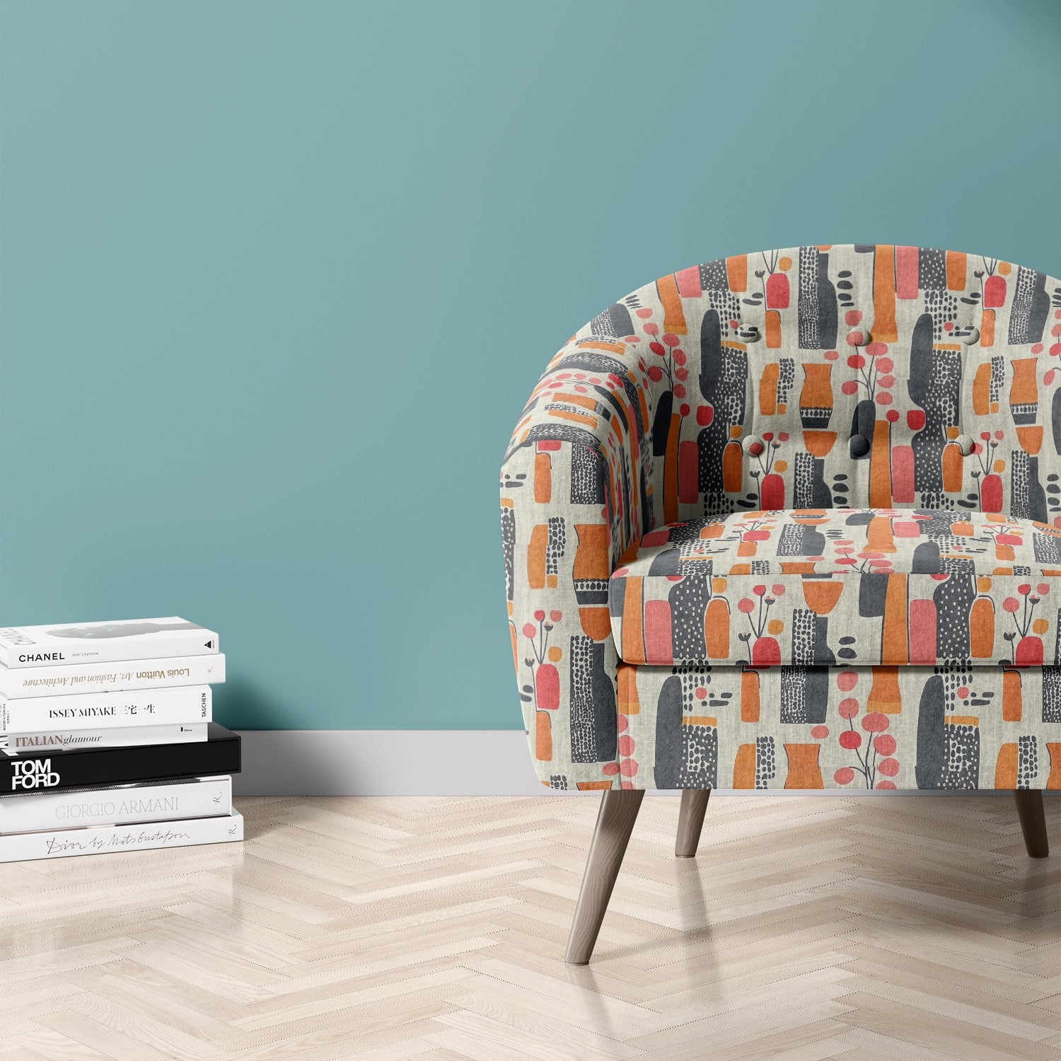 Tulpan No.18 upholstery fabric used on curved accent chair – bold multicoloured floral pattern