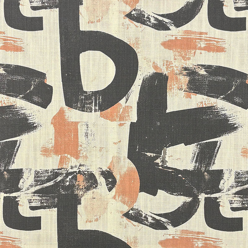 Statement upholstery fabric with bold black abstract brushstroke pattern and terracotta accents on a natural linen background
