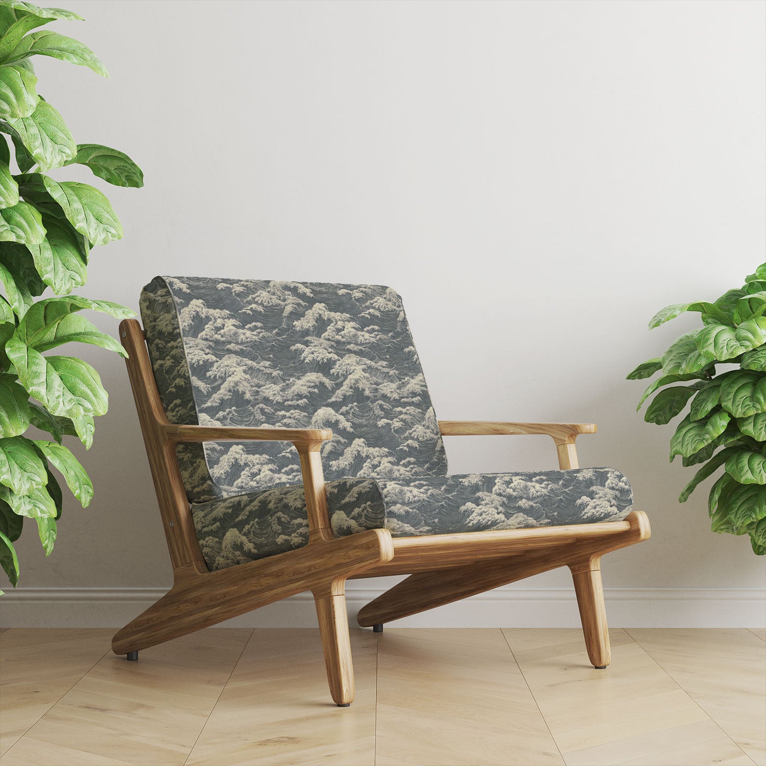 Grey wave upholstery fabric armchair showing textured ocean pattern in a modern neutral interior settin