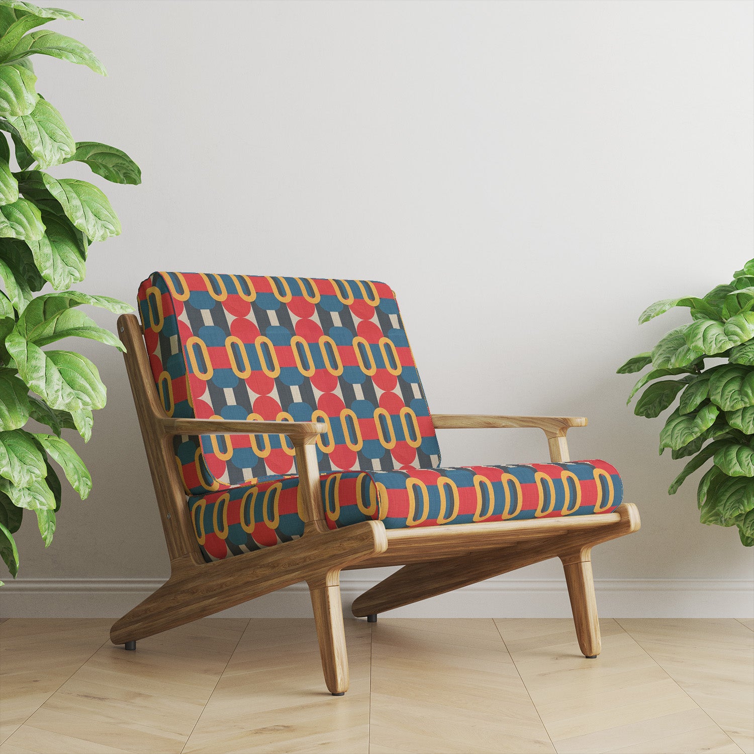 Sofa upholstered in blue geometric upholstery fabric with bold shapes
