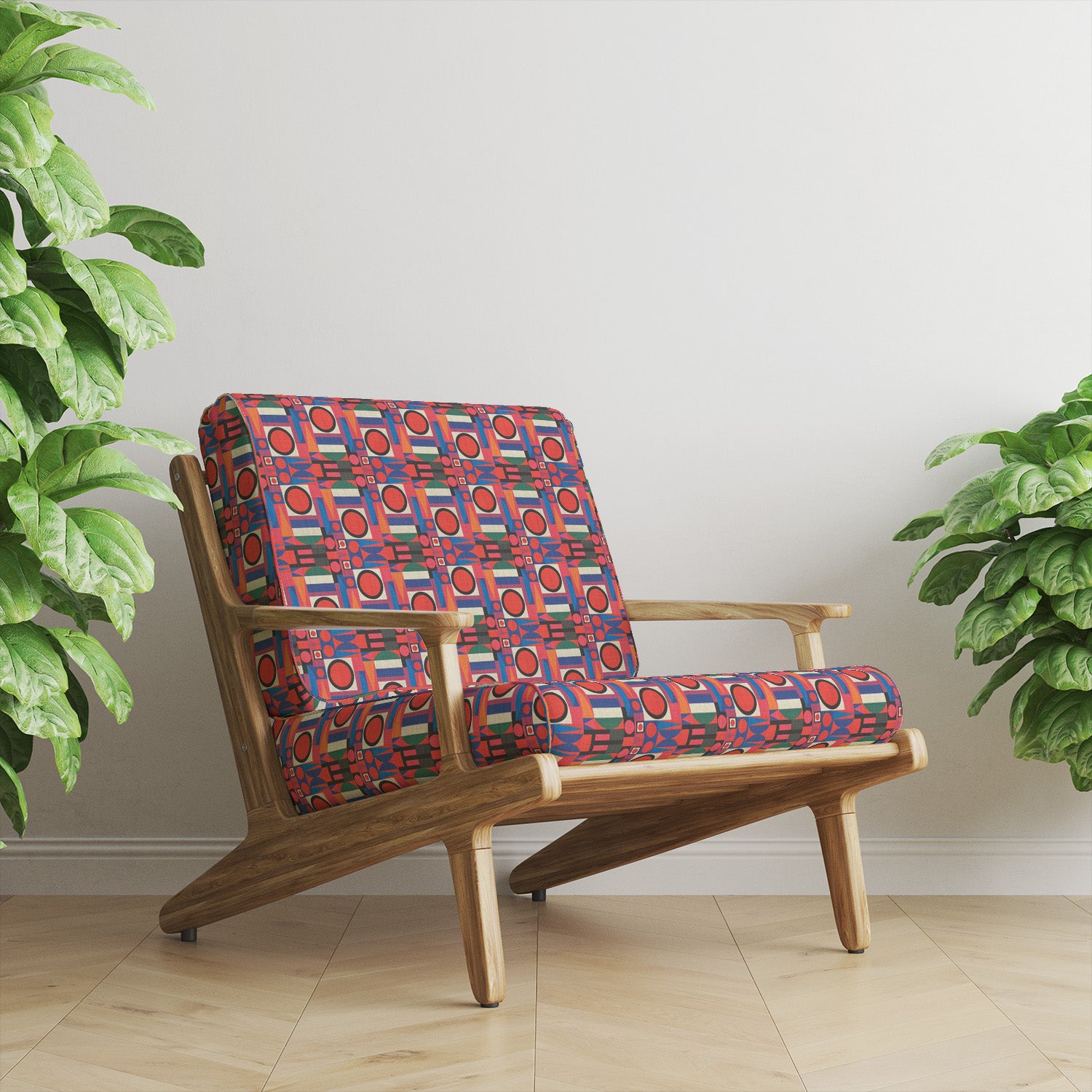 Weimar No.7 fabric styled on sofa with bold circular and striped pattern