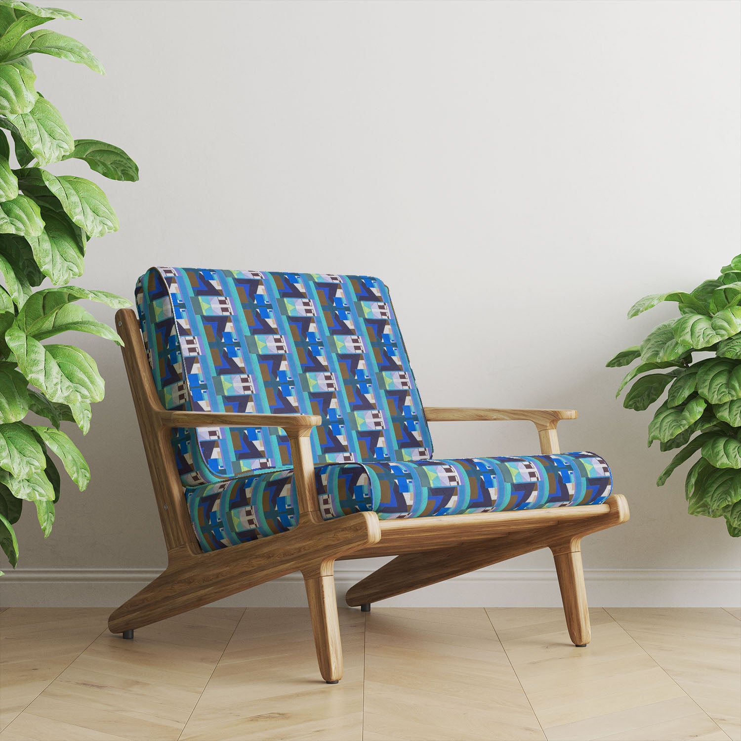 Chair upholstered in Weimar No.14 blue Crib5 velvet fabric with geometric Bauhaus pattern