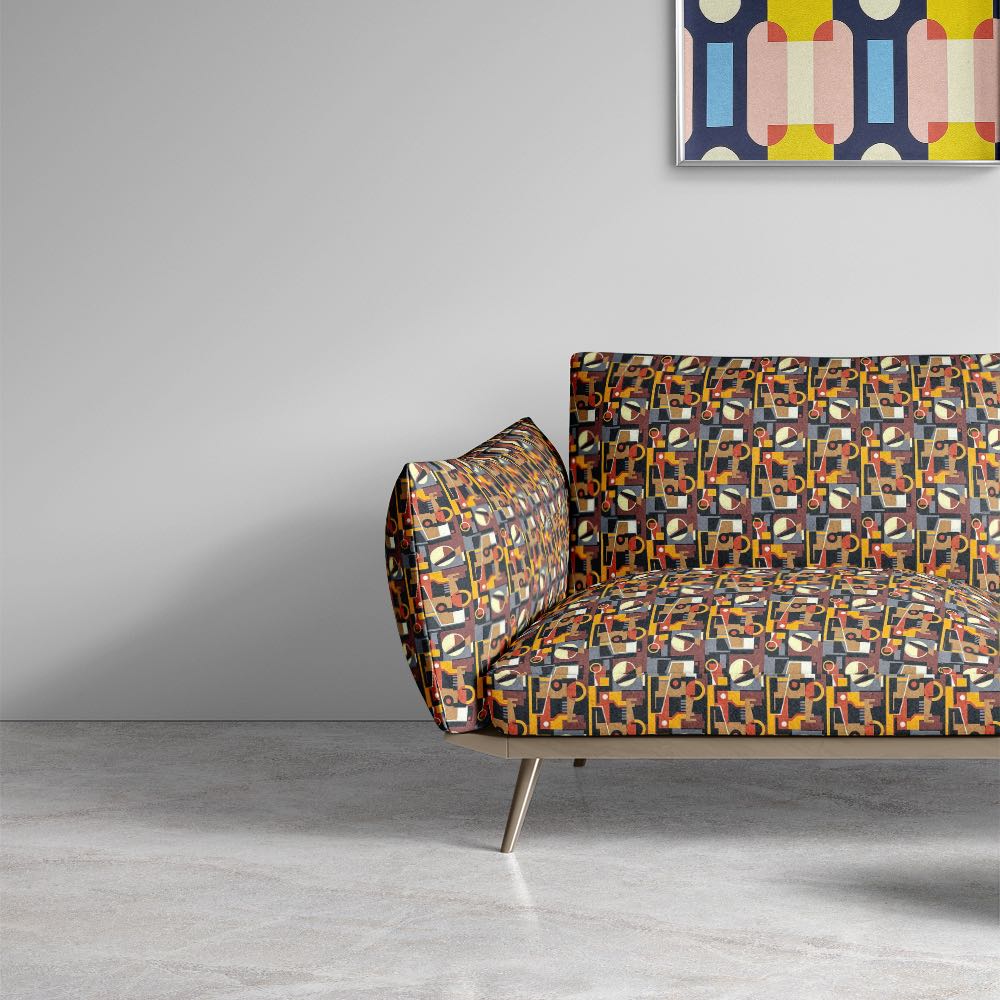 Sofa upholstered in Weimar No.9 Crib5 velvet fabric with warm geometric pattern